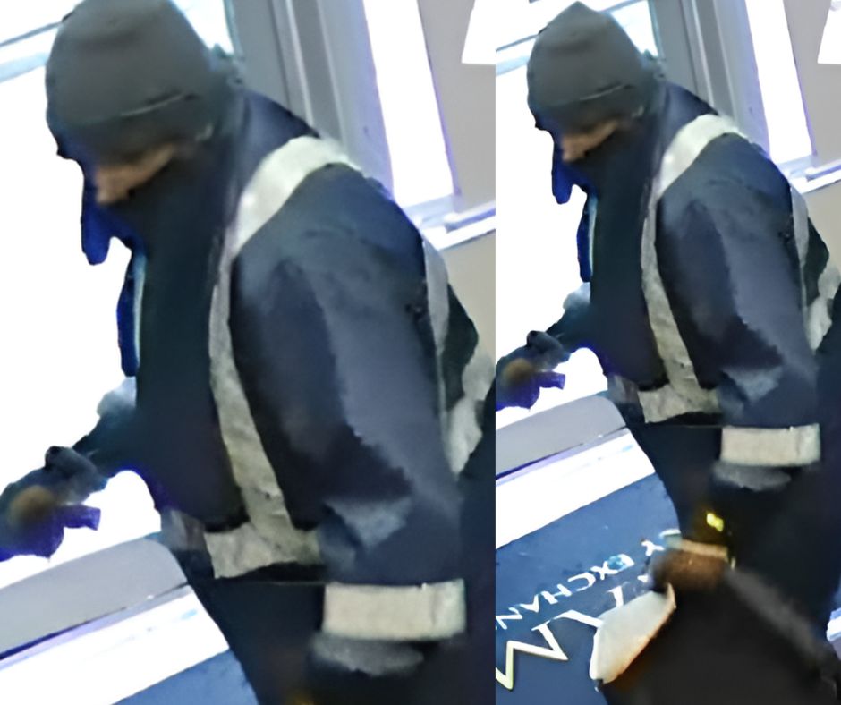 photo of masked man in a work coat 